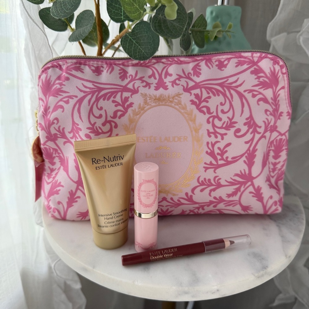 Estee Lauder Pink Floral Cosmetic Bag with Gifts Set